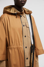 Vorassy Hooded Cape – the hooded puffer is crafted from recycled longue saison, a nylon fabric notable for – LUX VERSE Luxury Designer Fashion Outlet