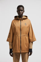 Vorassy Hooded Cape – the hooded puffer is crafted from recycled longue saison, a nylon fabric notable for – LUX VERSE Luxury Designer Fashion Outlet